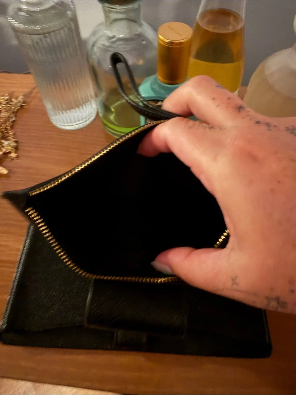 Coach Black Pebbled Leather Wristlet Wallet with Gold Logo Accent